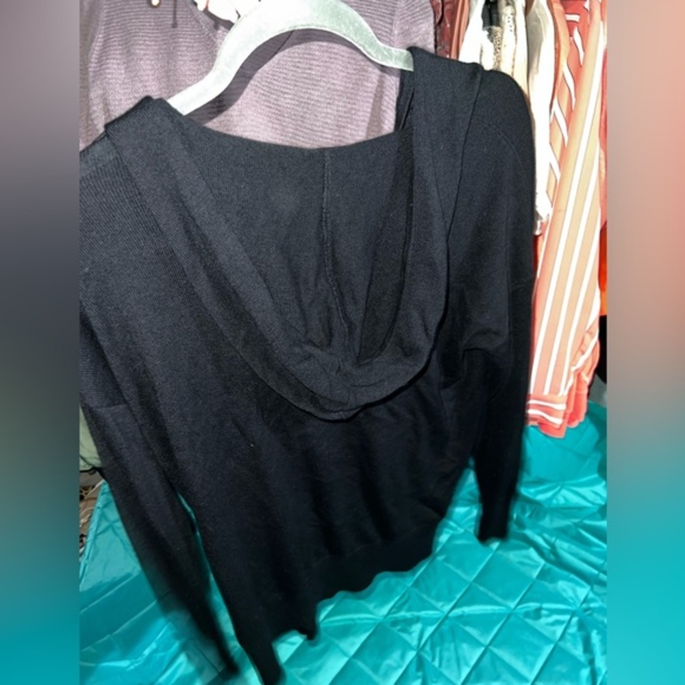 Feel the Piece by Terre Jacobs black hooded sweater​